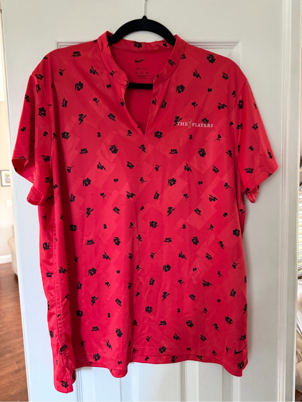 Nike Pink Short-Sleeve Golf Polo with Black Floral Print